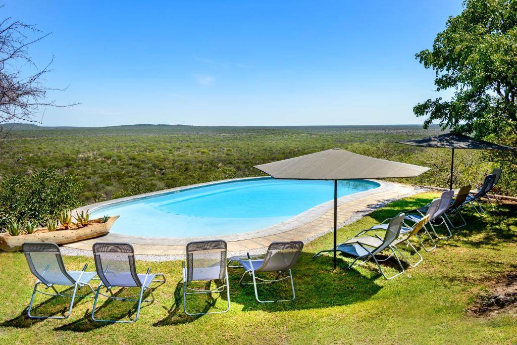 NO - Ethosa Safari Lodge en Etosha Parque Nacional 