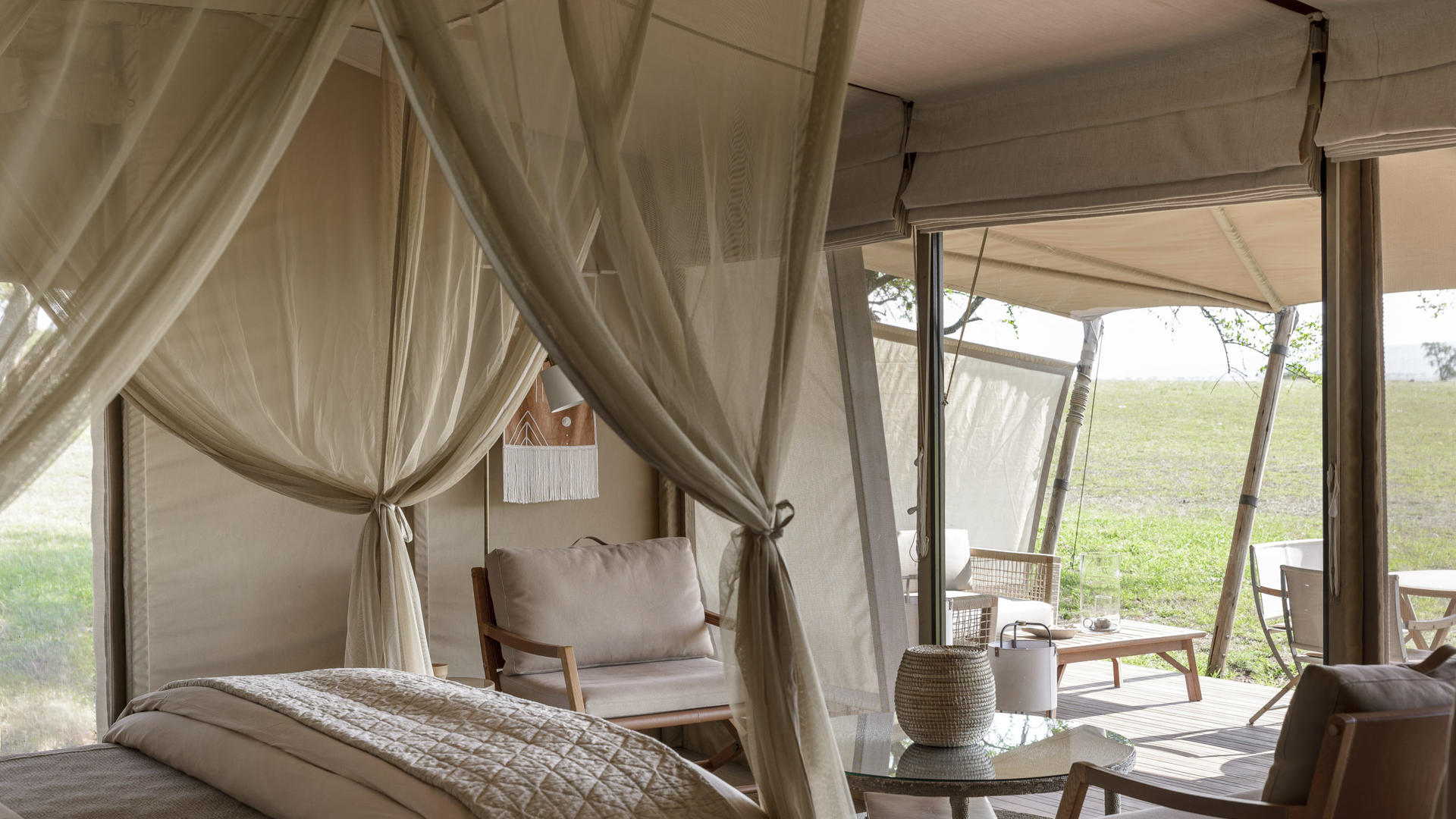 Singita sabora tented camp suite interior with views outside