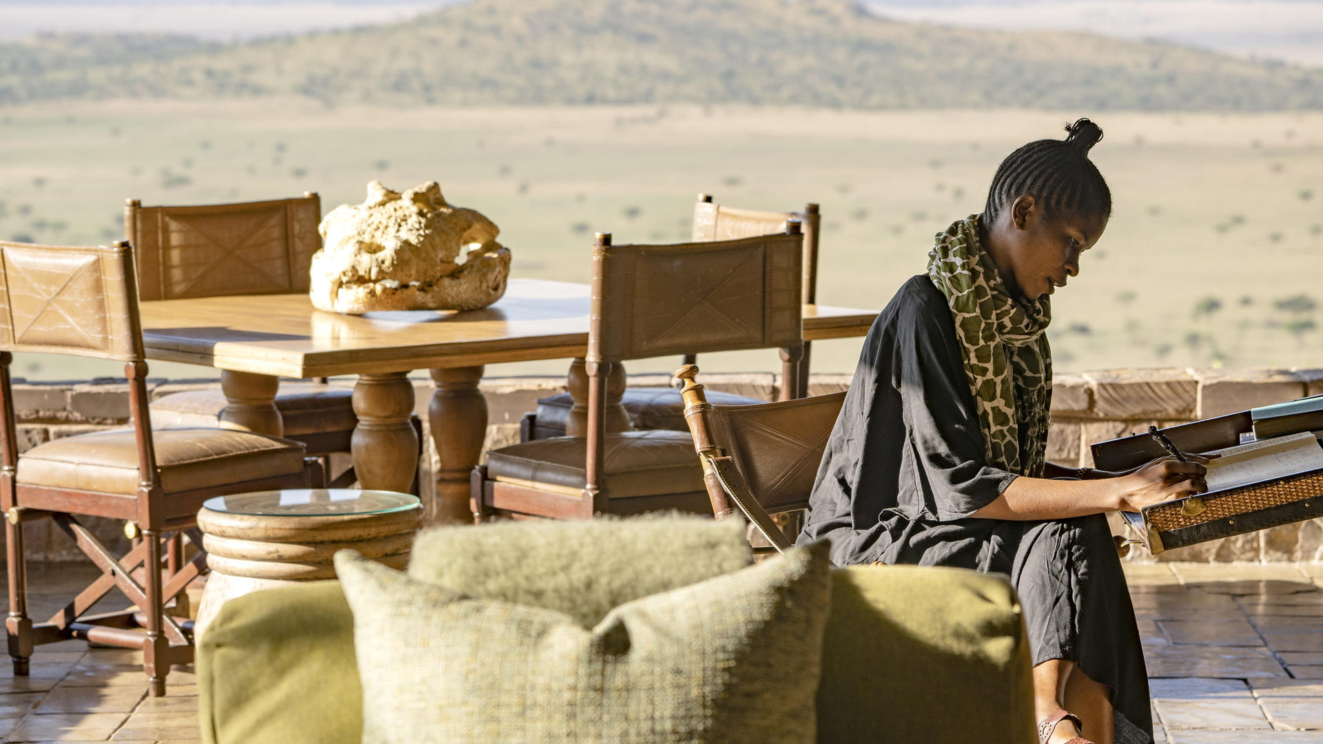 Singita sasakwa lodge guest on verandah
