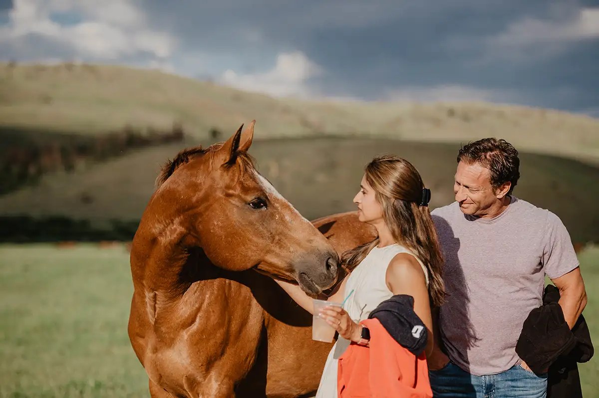 horse smiling at woman