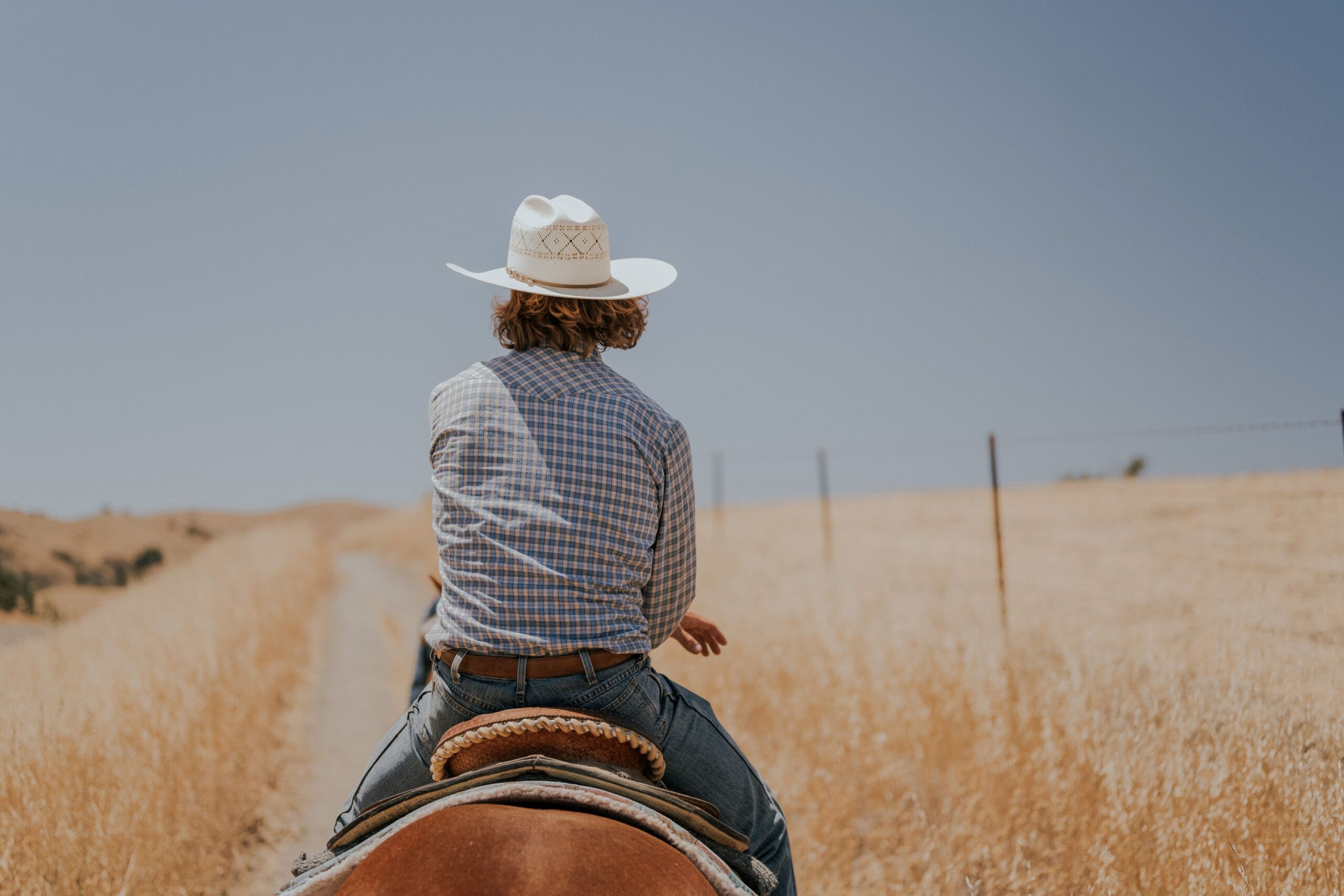 cowboy riding horse alisal ranch